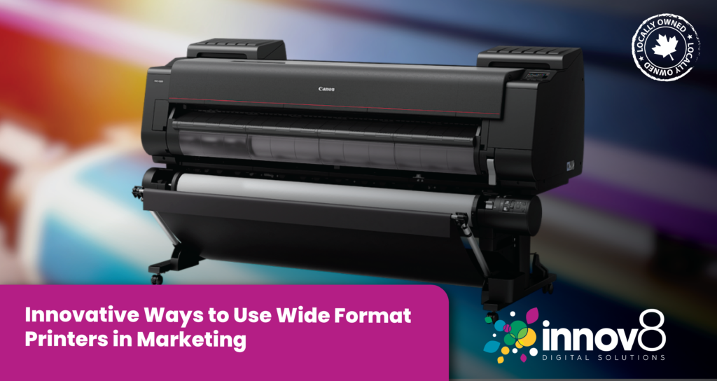 A Canon wide-format printer printing high-quality marketing materials in a professional setting.